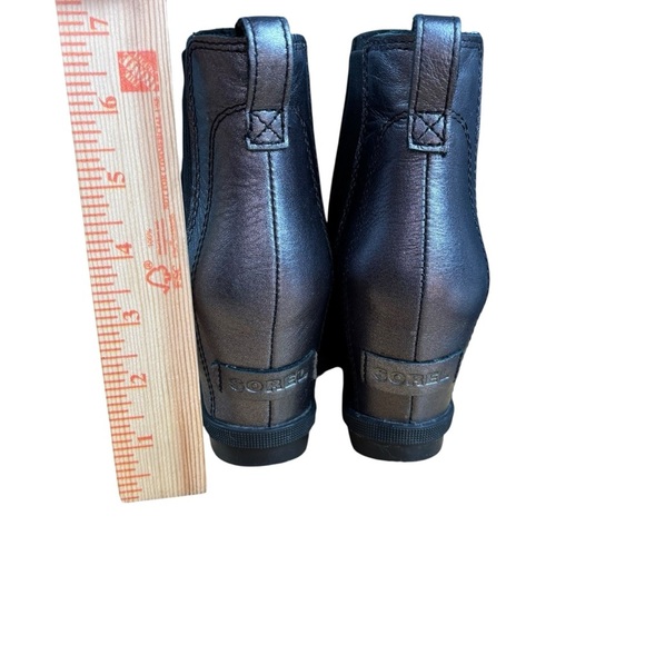 EUC Sorel Joan of Arctic Women’s 6.5 Black Wedge Bootie w/Silver Metallic heel - Picture 4 of 13